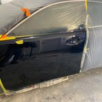 Blue car door dent repair after