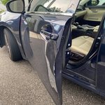 Blue car door dent repair before