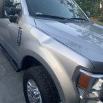F350 fender dent before