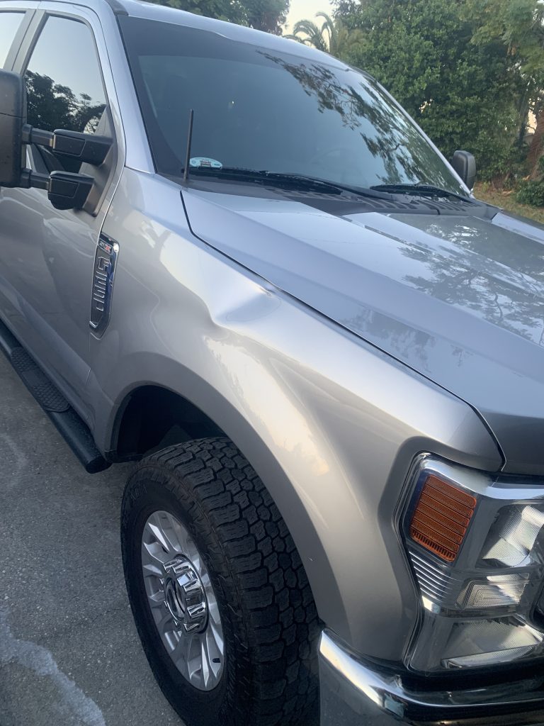 f350 fender dent repaired Deltona fl before